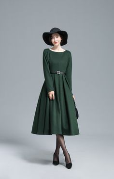 "Stay cozy in this green wool dress from Xiaolizi. The pleated dress made from a super soft wool in a fit and flare construction. The evening dress topped with a boat collar. The winter party dress finished with long sleeves. Details: * More colors https://etsy.me/3Egy6rJ * 35% wool blend, 35% fiber and polyester, 30% nylon * Polyester lining * Two seam pockets * Boat collar * Long sleeves * Regular fit * back zipper * pleated dress * Dry clean * The model is 170cm (5′7″) tall with a 80cm (31.5\ Green A-line Winter Dress, Winter Pleated Long Sleeve Midi Dress, Pleated Long Sleeve Midi Dress For Winter, Long Sleeve Pleated Midi Dress For Winter, Winter Wool A-line Dress, Fall A-line Midi Dress With Pleated Hem, Pleated Midi Dress For Winter, Green A-line Midi Dress For Fall, Green A-line Midi Dress For Winter