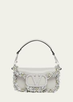 Valentino Garavani Loco Small Jeweled Leather Shoulder Bag Embellished Leather Rectangular Shoulder Bag, High-end Evening Shoulder Bag With Silver-tone Hardware, High-end Shoulder Bag With Silver-tone Hardware For Evening, Luxury Shoulder Bag With Palladium Hardware For Parties, Glamorous Crossbody Shoulder Bag With Detachable Strap, Designer Shoulder Bag With Palladium Hardware For Party, Designer Embellished Top Handle Shoulder Bag, Designer Embellished Rectangular Shoulder Bag, Designer Silver Bags