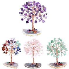 four different types of crystal tree on display