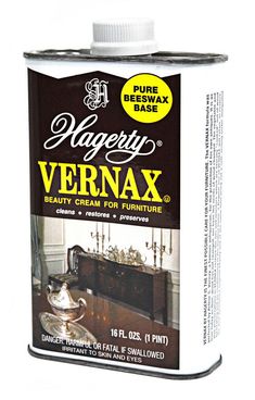 a can of vernax furniture polish on a white background