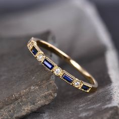 This is a unique vintage Sapphire and CZ ring in 925 sterling silver. This ring is marked 925 I accept custom making order.Please contact me if you need this service. All the jewelry in my store is handmade.It may take 2-3 weeks to finish. I accept custom making order.Please contact me if you need this service. This ring is closed ring.If you want a matching band,you can ask me custom make it. For all the jewelries,there is a 14 days money back guarantee.You can return it in the time frame witho Stackable Sapphire Birthstone Ring, Stackable Sapphire Birthstone Ring As Gift, Elegant Stackable Sapphire Birthstone Ring, Sapphire Stackable Birthstone Ring In 14k Gold, Sapphire Birthstone Ring, Dainty Style, Wedding Band Baguette, Amethyst Wedding Rings, Baguette Wedding Band, Opal Wedding Band