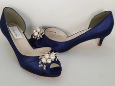 Shoes fit for a princess! Elegant peep toe Navy Blue Bridal Shoes are adorned with pearls and crystals. These Navy Blue Wedding Shoes have a comfortable kitten heel so you can wear them all night long. Designed in the USA. Shop your bridal accessories here! Wide width shoes and dyeable shoes available. Blue Heels Wedding, Navy Blue Wedding Shoes, Navy Blue Wedges, Blue Bridal Shoes, Navy Wedding Shoes, Cascade Design, Navy Blue Bridesmaids, Custom Wedding Shoes, Navy Blue Heels