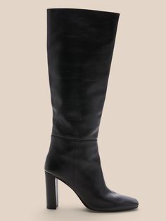 Soft and luxurious, these suede knee-high boots are handcrafted by a team of skilled artisans.  These suede 'Antonella' boots by Alexandre Birman have a slouchy silhouette and slender, yet sturdy block heels.  Suede uppers.  Leather lining.  Side zip Wide Calf Calf Leather Knee-high Boots For Fall, Fall Wide Calf Knee-high Boots In Calf Leather, Fall Wide Calf Knee-high Calf Leather Boots, Fall Calf Leather Knee-high Boots With Block Heel, Winter Calf Leather Knee-high Boots With Stacked Heel, Wide Calf Leather Mid-calf Boots With Block Heel, Calf Leather Knee-high Boots With Block Heel For Work, Chic Knee-high Boots With Sculpted Heel, Medium Width, Wide Calf Mid-calf Boots With Block Heel