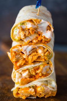 three burritos stacked on top of each other