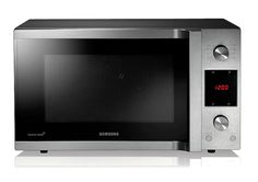 a stainless steel microwave oven with the door open