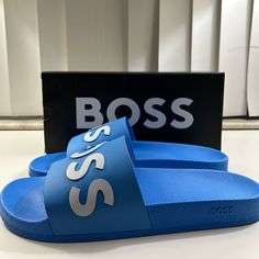 Men’s Hugo Boss Slides New. Perfect Condition. Size 13. Vibrant Amazing Color High Quality Material. Long Lasting And Durable. Very Fashionable! Casual Blue Slides For Streetwear, Hugo Boss Shoes, Boss Shoes, Sneakerhead Room, Men Slides, Slides Sandals, Slides Shoes, Sneaker Head, Flip Flop Sandals