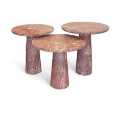 three wooden tables sitting on top of each other