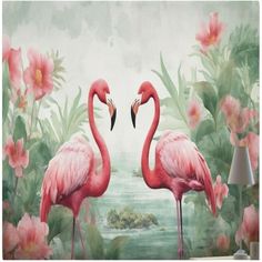 two pink flamingos standing next to each other