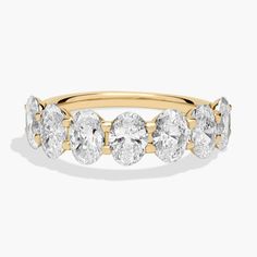 Classic and brilliant, this beautiful diamond band features seven brilliant oval-cut diamonds set in enduring 14k yellow gold. Oval Diamond Ring, Stone Diamond Ring, Platinum Rose Gold, Gold Rings Fashion, Engagement Rings Marquise, Gold Pearl Necklace, Ladies Diamond Rings, Oval Cut Diamond, Rose Gold Jewelry