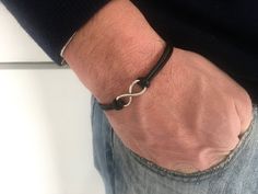 "Infinity  men bracelet, mens gift, minimalist bracelet for boy, for child, for boyfriend, simplistic. Personalized men bracelet Custom colors and sizes bracelet. Magnetic clasp, hypoallergenic. Very fashion and stylish  For other infinity bracelet :  https://www.etsy.com/it/listing/544457603/infinity-men-bracelet-cotton-cord?ref=shop_home_active_2 https://www.etsy.com/it/listing/530607904/inifinity-uomini-braccialetto-bracciale?ref=shop_home_active_3 for other nice solutions take a look to \"gi Black Infinity Bracelet For Friendship, Black Infinity Friendship Bracelet, Simple Black Bracelet For Gift, Simple Black Bracelets As Gift, Simple Black Bracelets For Gift, Simple Black Bracelets For Gifts, Minimalist Black Leather Bracelet As Gift, Minimalist Black Leather Bracelet Gift, Black Wristband For Father's Day