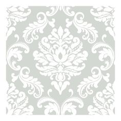 a white and gray wallpaper with an ornate design