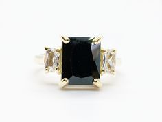 Don't miss this opportunity to own this beautiful gemstone ring crafted in 14k gold filled => Gemstone Type - Onyx, Clear Quartz => Gemstone Cut - Faceted => Gemstone Size - 8*10 mm, 3*5 mm => Total Number of Gemstones - 3 => Metal Type - 14k Gold Filled (Tarnish Resistant And Nickel Free) - also available in 925 sterling silver * Please contact me for pricing on a sizes larger than 11 * ~ Feel free to ask me about custom made designs. ❏ Replacements and custom orders : ✪ 925 ster Modern Ring With Rectangular Accent Stones, Modern Rings With Rectangular Accent Stones, Rectangular 14k Gold Jewelry With Accent Stones, Luxury Rings With Prong Setting And Rectangular Stone, Luxury Rings With Rectangular Center Stone, Luxury Rings With Center Stone And Rectangular Shape, Modern Jewelry With Rectangular Accent Stones, Rectangular Three Stone Diamond Jewelry, Three Stone Rectangular Diamond Jewelry