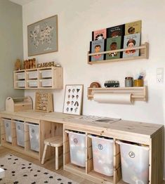 a room filled with lots of wooden shelves and bins