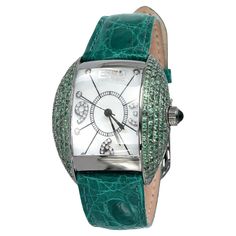 · Quality Swiss-Quartz movement guarantees precision timing · Mother-of-Pearl dial micro-paved with diamonds and gemstones enhances any dress style · Scratch-resistant sapphire glass lens · Genuine exotic lizard leather strap or stainless steel bracelet is stylish, comfortable, and durable · Gemological certificate; FREE fully insured shipping 4.20 CT of Diamonds and Tsavorite Watch Luxury, Accessories Brand, Leather Watch Bands, New Fashion Trends, Luxury Watches For Men, Ladies Watch, Watch Sale, 4 20, Leather Band