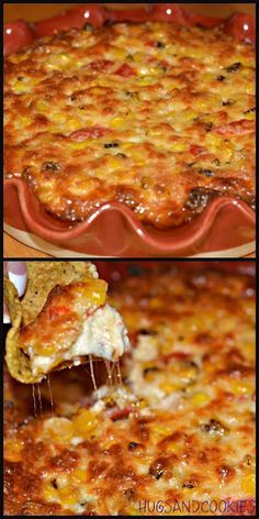 a close up of a cheesy pizza being lifted from a casserole dish