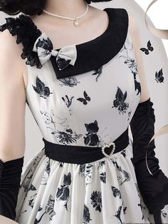 A classic sleeveless dress depicting gracefully dancing butterflies and adorable kittens playing. The waist belt is decorated with hearts. Soft, gorgeous and elegant. Although it is a colorless world, it is full of modest presence and graceful scenery. 
 
 ＜Color＞ 
 
 White 
 Ivory 
 Black 
 
 
 ＜Size＞ 
 
 
 S size 
 
 Length: 93cm 
 Bust: 84cm 
 Waist: 68cm 
 
 M size 
 
 Length: 94cm 
 Bust: 88cm 
 Waist: 72cm 
 
 L size 
 
 Length: 95cm 
 Bust: 92cm 
 Waist: 76cm 
 
 XL size 
 
 Length: 96cm Sleeveless Butterfly Print Party Dress, Sleeveless Black Dress With Butterfly Print, Black Sleeveless Dress With Butterfly Print, White Butterfly Print Dress For Party, Elegant Fitted Dresses With Butterfly Print, Elegant Party Dresses With Butterfly Print, Drawing Of Butterflies, Classical Dress, Adorable Kittens