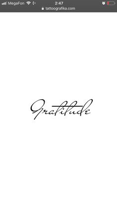 the word grateful written in cursive writing on a white paper with black ink