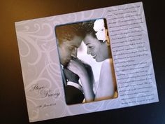 a wedding photo frame with a couple holding each other