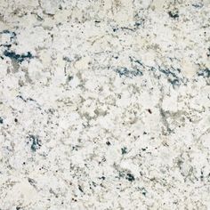 a white marble counter top with black and gray speckles