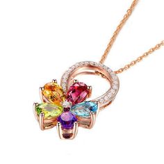 Bring a dynamic accent with this pendant necklace that bestows your jewelry collection with a glittering go-to piece. 15.75" L + 2" extender Pendant: 0.51'' W x 0.79'' H Lobster claw clasp 18k rose gold-plated copper / cubic zirconia / crystal Rose Gold Pendant Jewelry With Flower Charm, Rose Gold Flower Pendant Jewelry, Rose Gold Necklaces With Cubic Zirconia Flower Pendant, Rose Gold Flower-shaped Cubic Zirconia Necklaces, Rose Gold Flower-shaped Cubic Zirconia Necklace, Rose Gold Cubic Zirconia Necklace With Flower Pendant, Fine Jewelry With Cubic Zirconia Flower Charm, Rose Gold Flower-shaped Jewelry With Adjustable Chain, Cubic Zirconia Pendant With Flower Charm