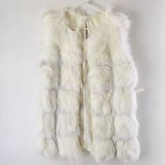 Adorable White Faux Fur Vest For The Upcoming Fashion Season! It Is Light, Soft Faux Fur, And Still Has Tags. The Material Does Not Stretch. Ask Questions! White Faux Fur Outerwear For Spring, White Faux Fur Coat For Spring, White Faux Fur Outerwear For Cold Weather, Chic White Fluffy Outerwear, Faux Fur Long Vest, Faux Fur Vest White, Winter Faux Fur Vest With Fur Trim, White Faux Fur Vest, Winter White Faux Fur-lined Outerwear