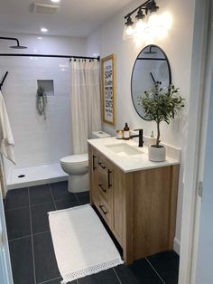 a bathroom with a sink, toilet and bathtub