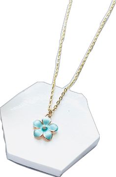 Blue Dainty Necklace With Clavicle Chain, Dainty Blue Clavicle Chain Necklace, Blue Flower-shaped Jewelry With Flower Charm, Blue Flower-shaped Jewelry With Flower Decoration, Turquoise Flower Charm Jewelry, Turquoise Flower Necklace With Flower Charm, Blue Flower Shaped Jewelry With Flower Decoration, Turquoise Flower-shaped Jewelry With Flower Charm, Blue Floral Jewelry With Flower Decoration