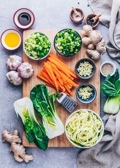 various vegetables are on a cutting board and ready to be used as an appetizer