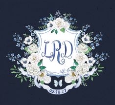 the monogrammed logo is surrounded by white flowers and blue leaves on a black background