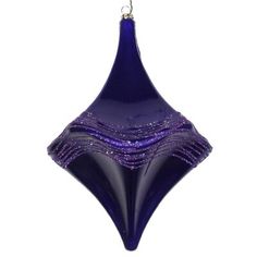 a purple glass ornament hanging from a chain