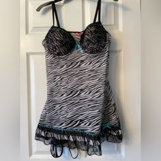 Nwot Pucker Up Black And White Zebra Print, Sheer Babydoll With Black Lace Trim, Teal Ribbon And Attached Matching Panties. A-Line, Underwire And Adjustable Straps For A Flattering Fit. Excellent Condition. Never Worn. No Stains, Tears Or Odors. Smoke Free Home. Fitted Camisole Tops For Sleepover, Fitted Sleeveless Tops For Sleepover, Teal Ribbon, Black Lace Trim, White Zebra, Zebra Print, Baby Doll, Women's Intimates, Black Lace