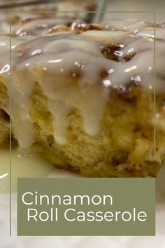 a cinnamon roll casserole with icing on a white plate and text overlay reads, cinnamon roll casserole