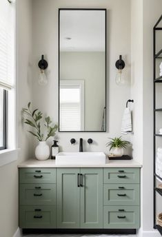 A minimalist bathroom vanity in Evergreen Fog with clean lines and a neutral color palette. Minimalist Bathroom Vanity, Minimalist Vanity, Minimalist Bathroom, Neutral Decor, Classic Elegance, Shades Of Green