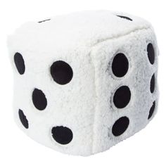 a white dice with black spots on it