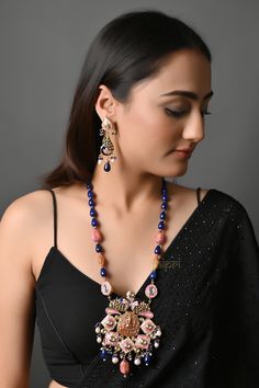 Antique Polish Fusion Party Wear Indian Ethnic Jewellery Set With Earrings, Long Indian Pendant Necklace Set, Jadau Jaipuri Jewellery This beautiful piece is an absolute show-stealer. It features meenakari motifs combined with tinch of Kundan and temple work. The strings are strewn with blue semi-precious stones.  PRODUCT DETAIL: * Necklace Length: 24 inches (comes with adjustable Lock) * Earrings Length: 2.75 inches approx * Material: Brass and stone * Package: Necklace and Earring STYLE TIP: This beautiful piece is made for a modern-day lady who has her heart in the little details of her heritage. A perfect fit for sarees and ethnic dresses ABOUT US: Jaipri makes each piece of its product by learning techniques and crafts from deep down in the local markets and villages. We use Indian ra Traditional Beaded Chandbali Danglers, Traditional Beaded Chandbalis For Festive Occasions, Multicolor Beaded Temple Jewelry Earrings, Bohemian Meenakari Necklaces For Parties, Bohemian Meenakari Necklace For Party, Bohemian Meenakari Jewelry For Celebration, Traditional Jewelry With Latkans For Party, Bohemian Temple Necklace With Meenakari Chandbali, Bohemian Meenakari Temple Necklace For Diwali