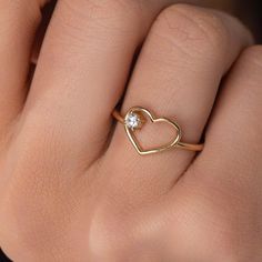 Diamond Heart Ring Diamond Heart Ring, 14k Solid Gold Engagement Ring, White/Rose/Yellow Solid Gold Diamond Ring, Anniversary Ring, Gift for her RING INFORMATION *  Metal: 14k Solid Gold or 18k Solid Gold *  Band Width: 1.40mm *  Heart Width: 9.30mm * Average Weight: 1.60gr approx, DIAMONDS * Type: Diamonds * Shape: Round * 3.00mm * Carat total weight: 0.10ct * Setting: Prong * Color: F/G * Clarity: VS2 * Symmetry/Cut: Excellent * Certificate of Authenticity  Solid gold pieces are made to last f Engagement Design, Luxury Jewelry Brands, Diamond Heart Ring, Thoughtful Gifts For Her, Her Ring, Solid Gold Band, Gold Armband, Gold Diamond Ring, Rose Yellow