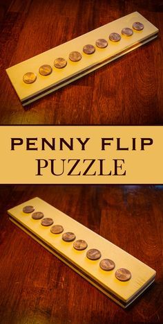 the penny flip puzzle is shown on a wooden table