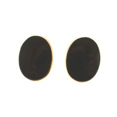 Surprise your special lady (or treat yourself) with these screw-on earrings--no pierced ears required! These classy 14 karat solid yellow gold earrings are bezel-set with oval onyx cabochons, each measuring 15.83 millimeters long by 11.63 millimeters wide, and each weighing an estimated 3.36 carats. The clasps match and each is stamped 14K. Each earring measures 16.54 millimeters (just over 5/8 inch) long by 12.5 millimeters (just under 1/2 inch) wide. They are stamped 14K on the screw heads, an Black Oval Earrings For Anniversary, Classic Black Oval Earrings, Black Oval Earrings For Formal Occasions, Classic Black Clip-on Earrings For Formal Occasions, Classic Oval Clip-on Earrings With Polished Finish, Vintage Diamond Earrings, Lapis Lazuli Earrings, Yellow Gold Earrings, All Gems