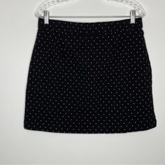 Rafaella Comfort Polka Dot Skort. Black And White Polka Dot Print Skirt Over Solid Black Shorts. Pull On Style With Hidden Elastic Waist. Small Side Slits At Bottom Hem. New Without Tags. Size: Medium Fabric: Shell: 77/20/3 Viscose/Nylon/Elastane Lining: 95/5 Polyester/Elastane Waist: 16.5“ Length: 17.5“ Inseam: 4.5“ Condition: Nwot All Measurements Taken While Item Laid Flat I Love Questions So Please Comment Below If You Have Any! Poshmark Ambassador Top Rated Seller Fast Shipping Smoke Free & Love Questions, Polka Dot Skirt, Dot Skirt, Print Skirt, Polka Dot Print, Dot Print, Printed Skirts, White Polka Dot, Black Shorts