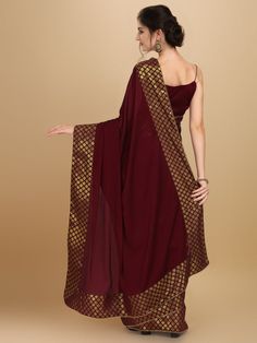 Maroon and gold-toned sareeSolid woven design saree with woven design borderHas patchwork detailThe saree comes with an unstitched blouse pieceThe blouse worn by the model might be for modelling purpose only. Check the image of the blouse piece to understand how the actual blouse piece looks like.