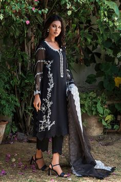 This beauteous black ensemble is comprised of soft khaddi net fabric embellished with graceful cutwork and exquisite hand pearl work details further graced with elegant applique work. Pair it with a cutwork dupatta with thread details. Dupatta as is can be added. Pakistani Designer Dress, Pakistan Clothes, Pearl Work, Applique Work, Net Fabric, Pakistani Dress Design, Pakistani Designers, Designer Dress, Fashion Consultant