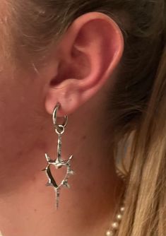 Silver heart thorn earring- Gothic dangle heart earring- Spiked thorn earring punk jewelery- Gothic jewelry gift for her y2k alternative Gothic thorn heart earring with dangle Material: stainless steel Cute punk earring You will receive:1 x pair of heart earring