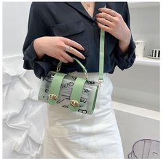 SPECIFICATIONS women's bag color: black, white, green shoulder bag pattern: solid opening mode: lock model number: DC6182 messenger bag width: 6.5 cm lining material: polyster ladies handbag style: fashion handbag material: PVC female bag height: 12.5 cm crossbody bag length: 20.5 cm bags for women weight: 0.2 kg bag size: small Types of bags: Handbags & Crossbody bags Style: Fashion Shape: Square Place Of Origin: GUANG DONG Province Pattern Type: Letter Origin: CN(Origin) Number of Handles/Stra Trendy Satchel With Clear Strap, Trendy Shoulder Bag With Clear Strap, Trendy Green Shoulder Bag For Office, Trendy Green Office Bag, Casual Green Satchel For Office, Trendy Clear Bag For Spring, Trendy Clear Bags For Spring, Trendy Summer Office Shoulder Bag, Green Bag With Clear Strap For Daily Use