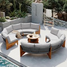 an outdoor living area with couches and tables next to a swimming pool in the background