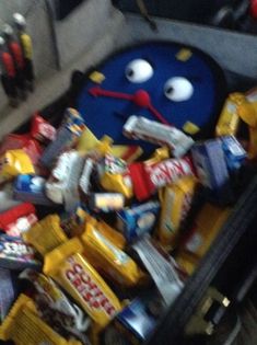 a bag filled with candy and other items