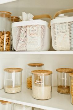 the shelves are filled with different types of cookies and other items in glass containers on them