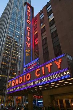 the radio city christmas spectacular sign is lit up