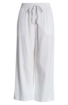 These lightweight linen pants are cut with cropped wide legs and topped with a comfortable elastic-drawstring waist. 25" inseam; 25" leg opening; 11" front rise; 15 1/2" back rise (size Medium) Elastic/drawstring waist Front slant pockets; back patch pockets 100% linen Machine wash, tumble dry Imported Summer White Wide Leg Pants With Drawstring, White Drawstring Wide Leg Pants For Summer, Spring Ankle-length Wide Leg Pants With Drawstring, Relaxed Fit Wide Leg Linen Pants For Daywear, Linen Wide Leg Bottoms With Drawstring, Wide Leg Linen Bottoms With Drawstring, Relaxed Fit Cropped Leg Bottoms For Beach, Spring Linen Wide Leg Pants With Drawstring, Linen Wide Leg Pants With Drawstring For Loungewear