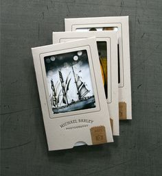 three cards with pictures of sailing ships on them