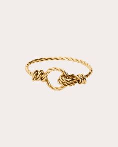 Designed to symbolize attachment to one another, this interlocked ring is handcrafted from twisted 14-karat gold-filled wire. From Atelier Paulin's Original Collection. 14k yellow gold-filled base metal Polish with soft cloth Made in France Measurements Wire thickness: 1mm